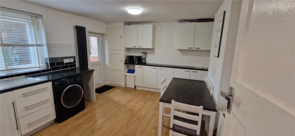 Spacious 2-Bedroom Period Conversion with Garden, Garage,
